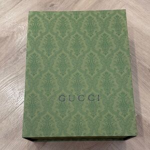 Gucci Box with dust bag. Mint condition. 36x28x12cm